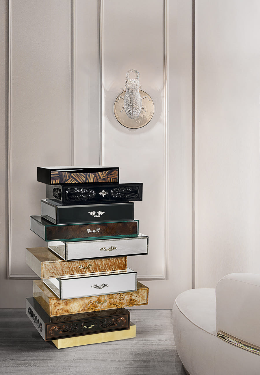 A modern interior design inspiration with a gold and luxurious chest of drawers.