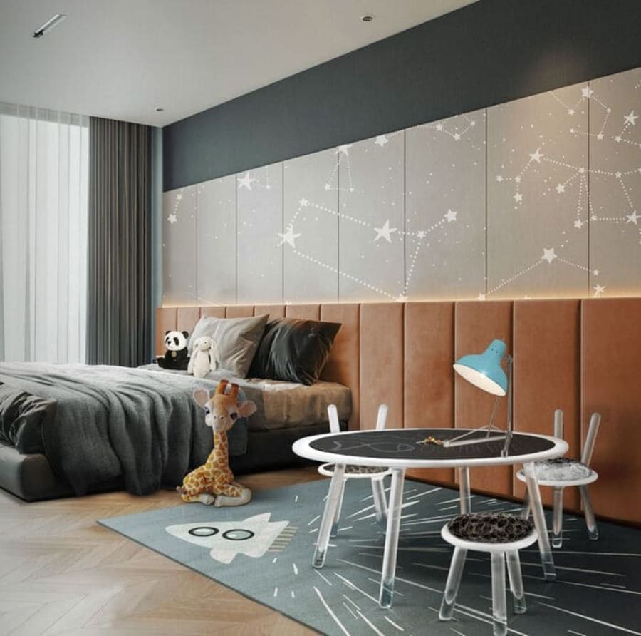 Neutral-toned bedroom with a small play and learn area for a little kid.